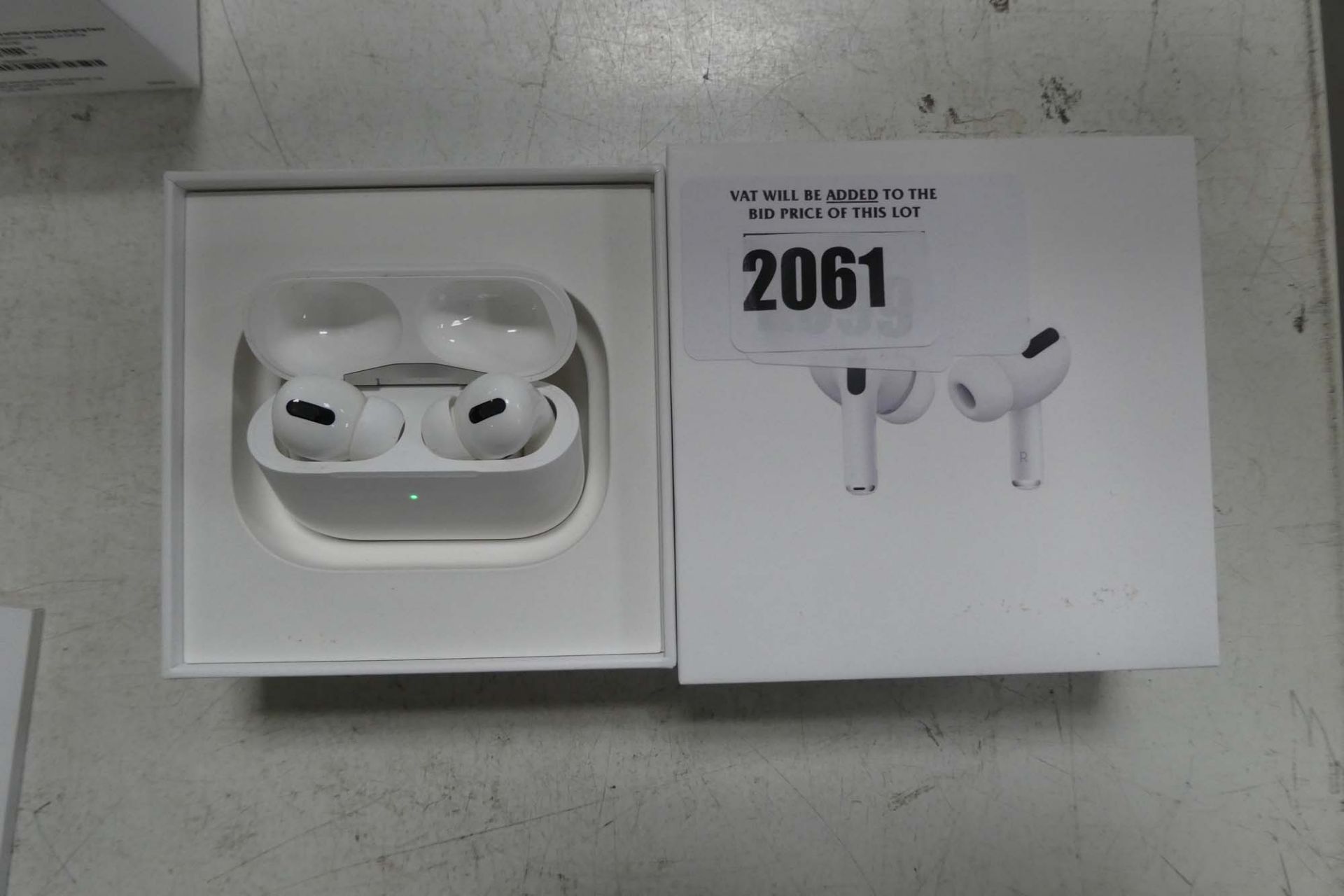 2099 Boxed pair of Apple AirPods Pro with wireless charging case and box