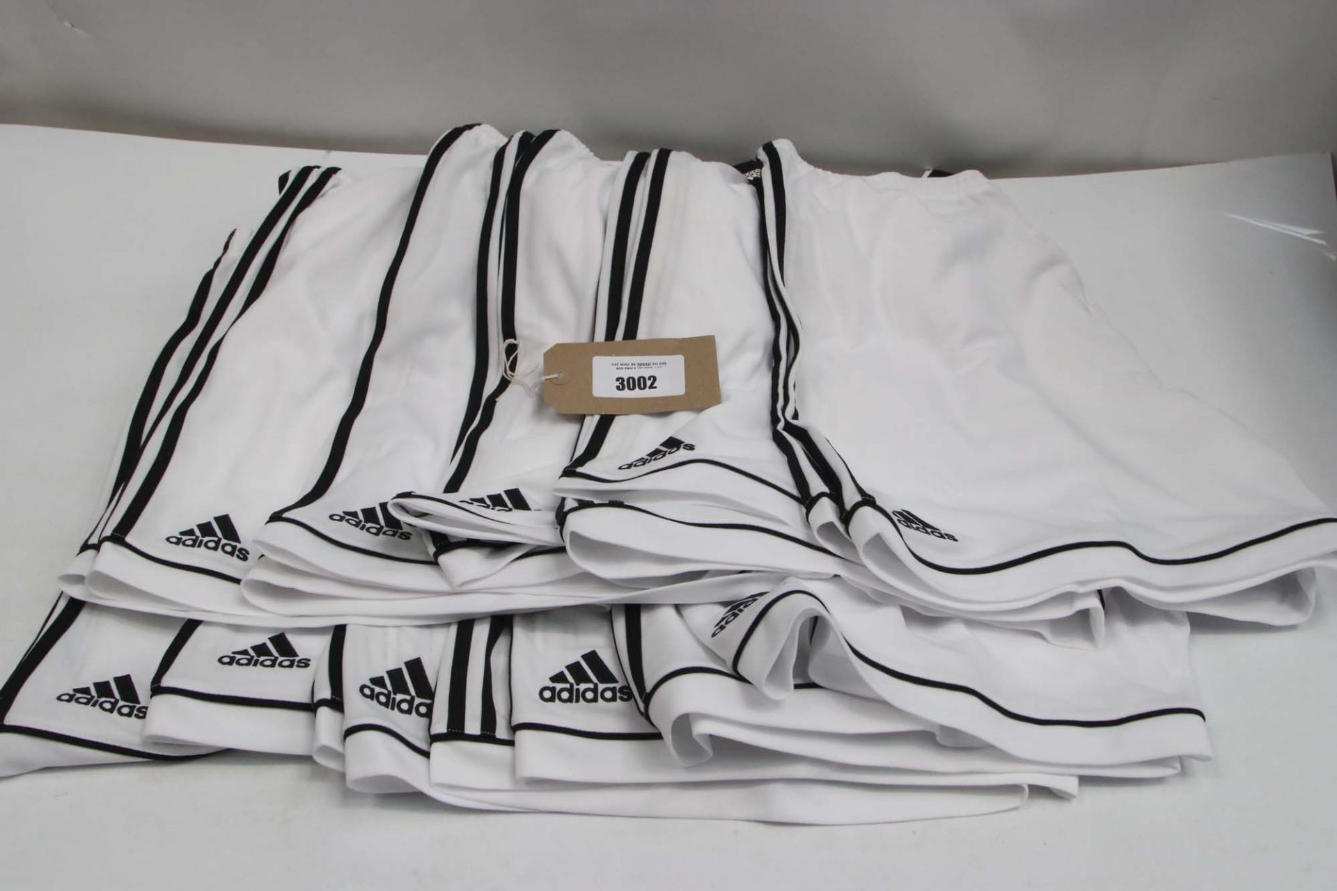 10 pairs of Climalite shorts in white with black stripe