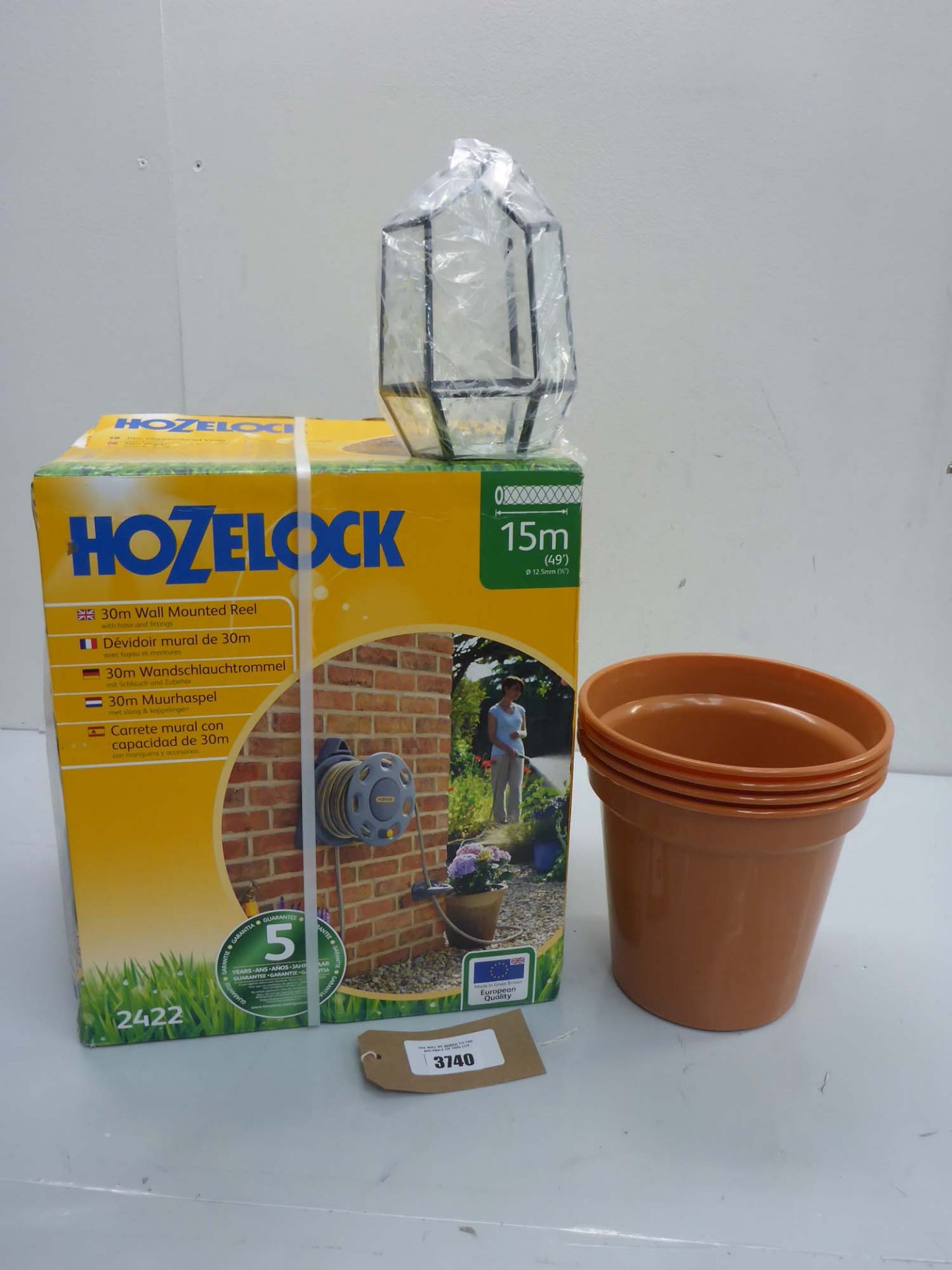 Hozelock 15m wall mounted hose & reel, plant terrarium and 4 plant pots