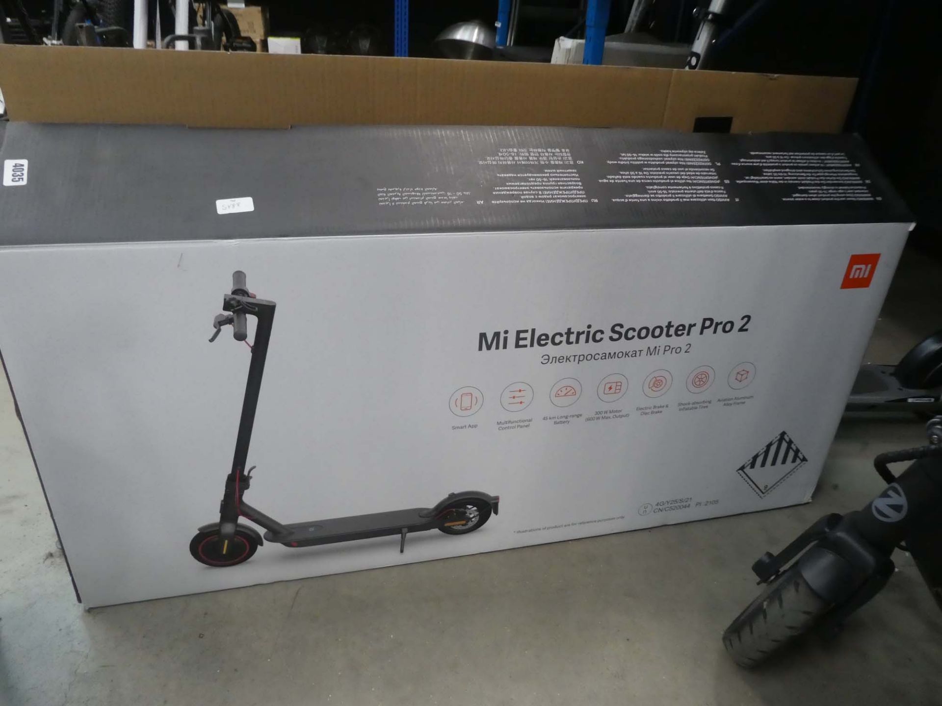 Boxed electric scooter with charger