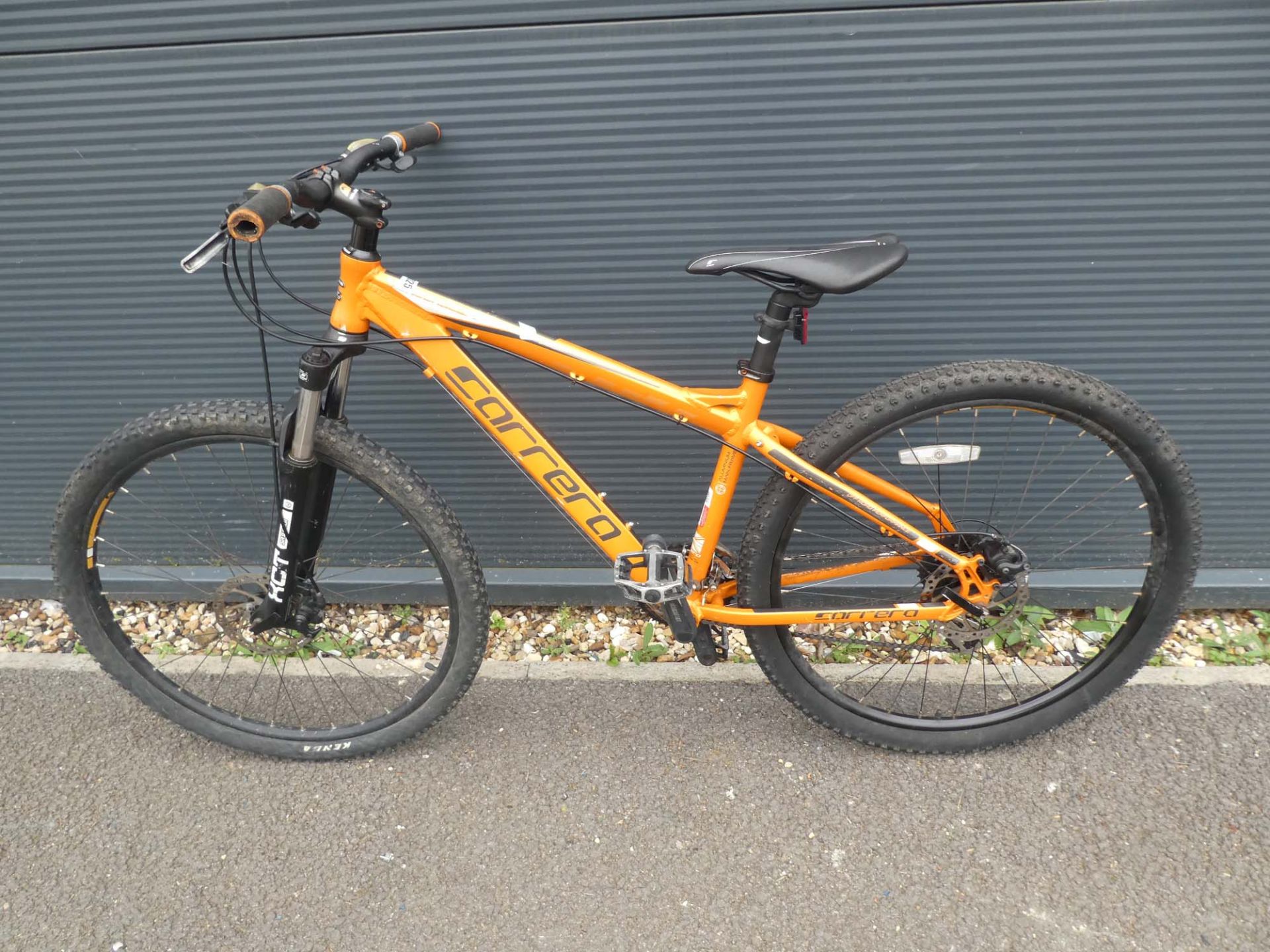 Carrera mountain bike in orange