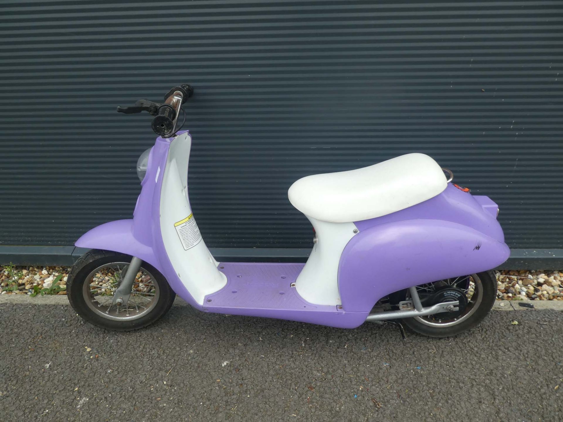 Small purple electric scooter, no charger