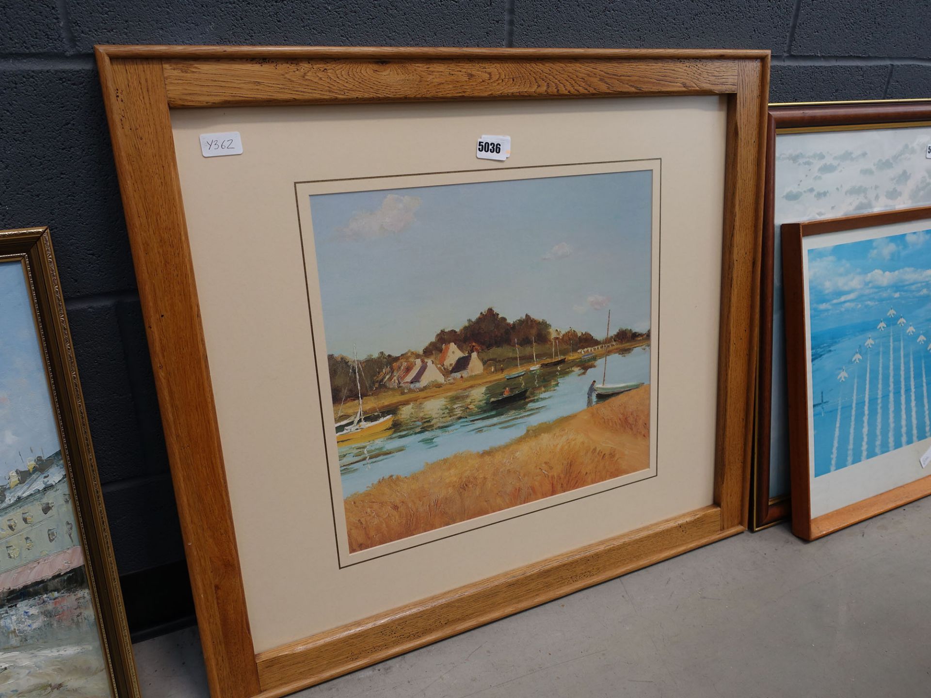 5024 - Framed and glazed print of estuary with cottages and yacht