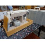 Cased electric sewing machine