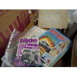 Box containing movie and pop magazines