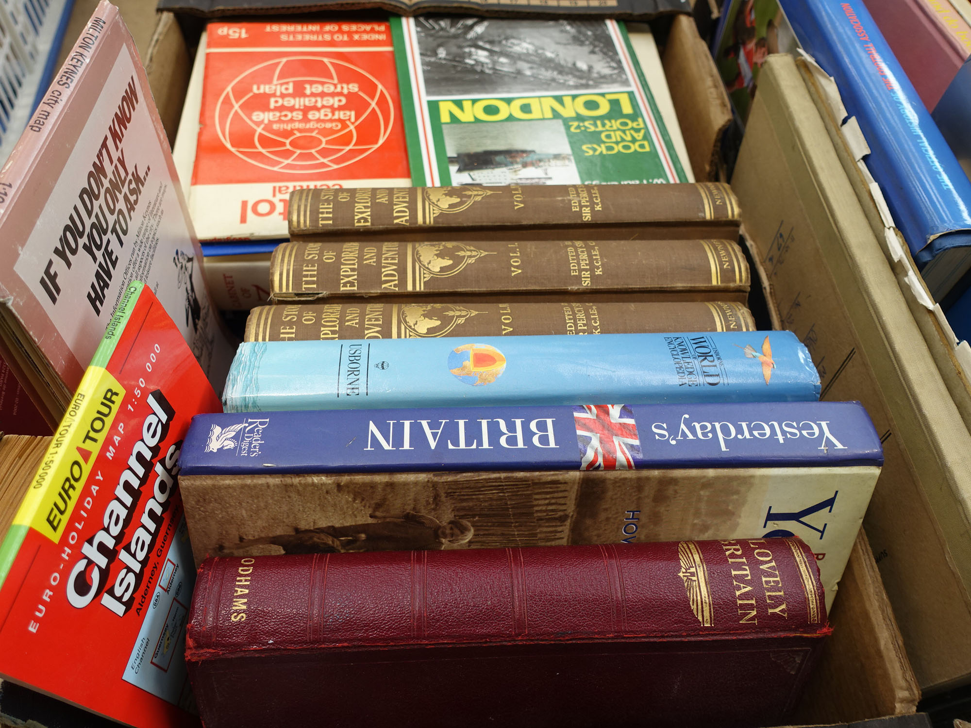 2 boxes containing Exploration, sewing and historical reference books plus Yoga and cookery books