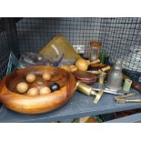 Cage containing turned wooden fruit bowl, bowls, measuring tape, brass bottle opener, nut cracker,