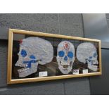 5078 - Print with 3 crystal skulls in the style of Damien Hirst