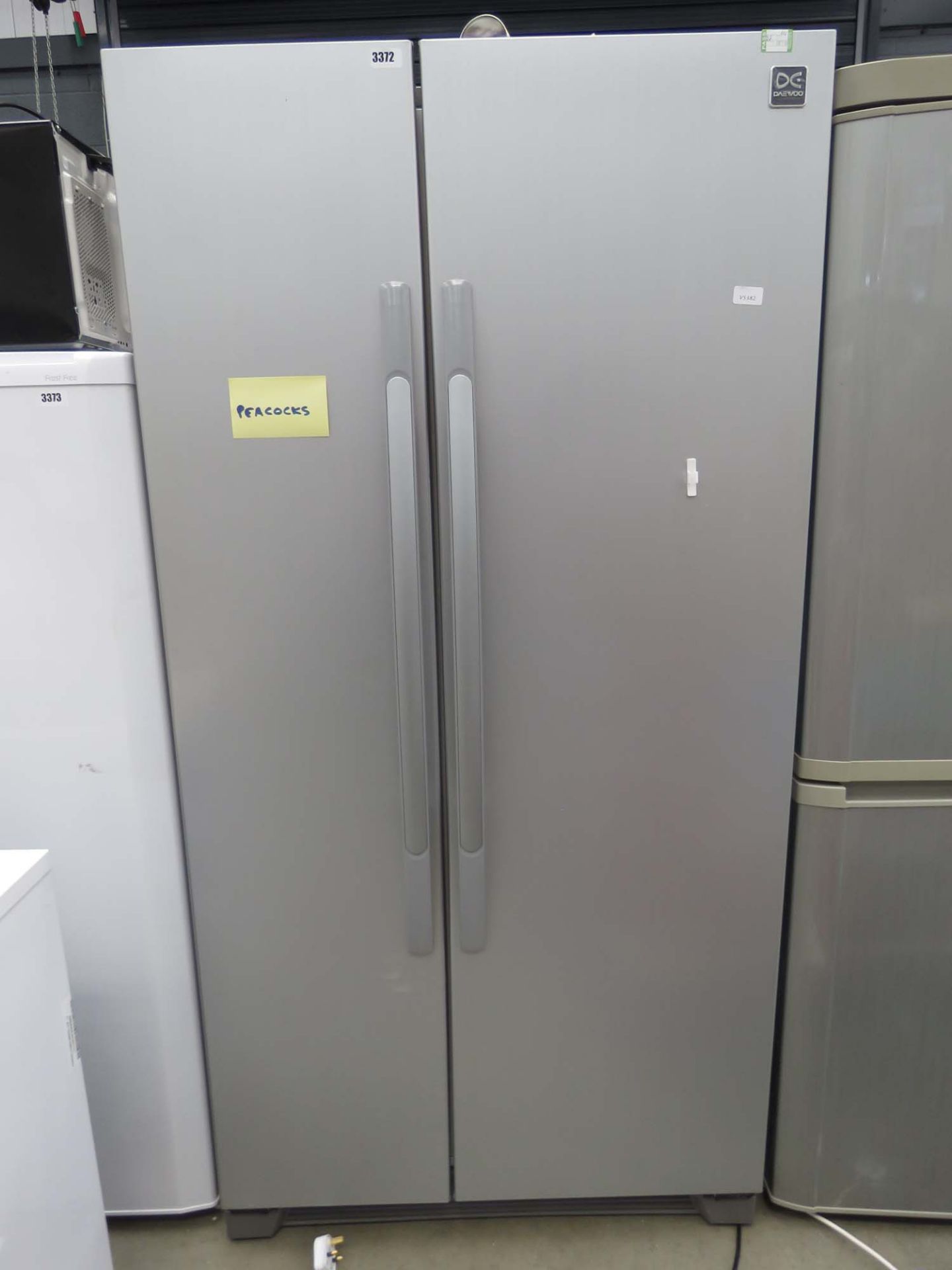 (111) Daewoo American style fridge freezer