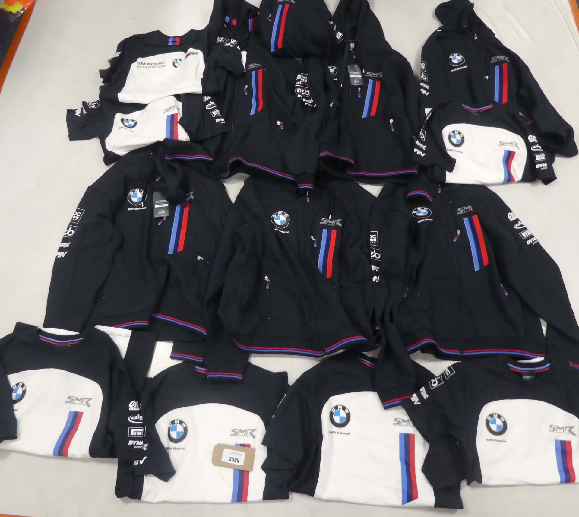 Bag containing 14 BMW Motorrad t shrts and hoodies