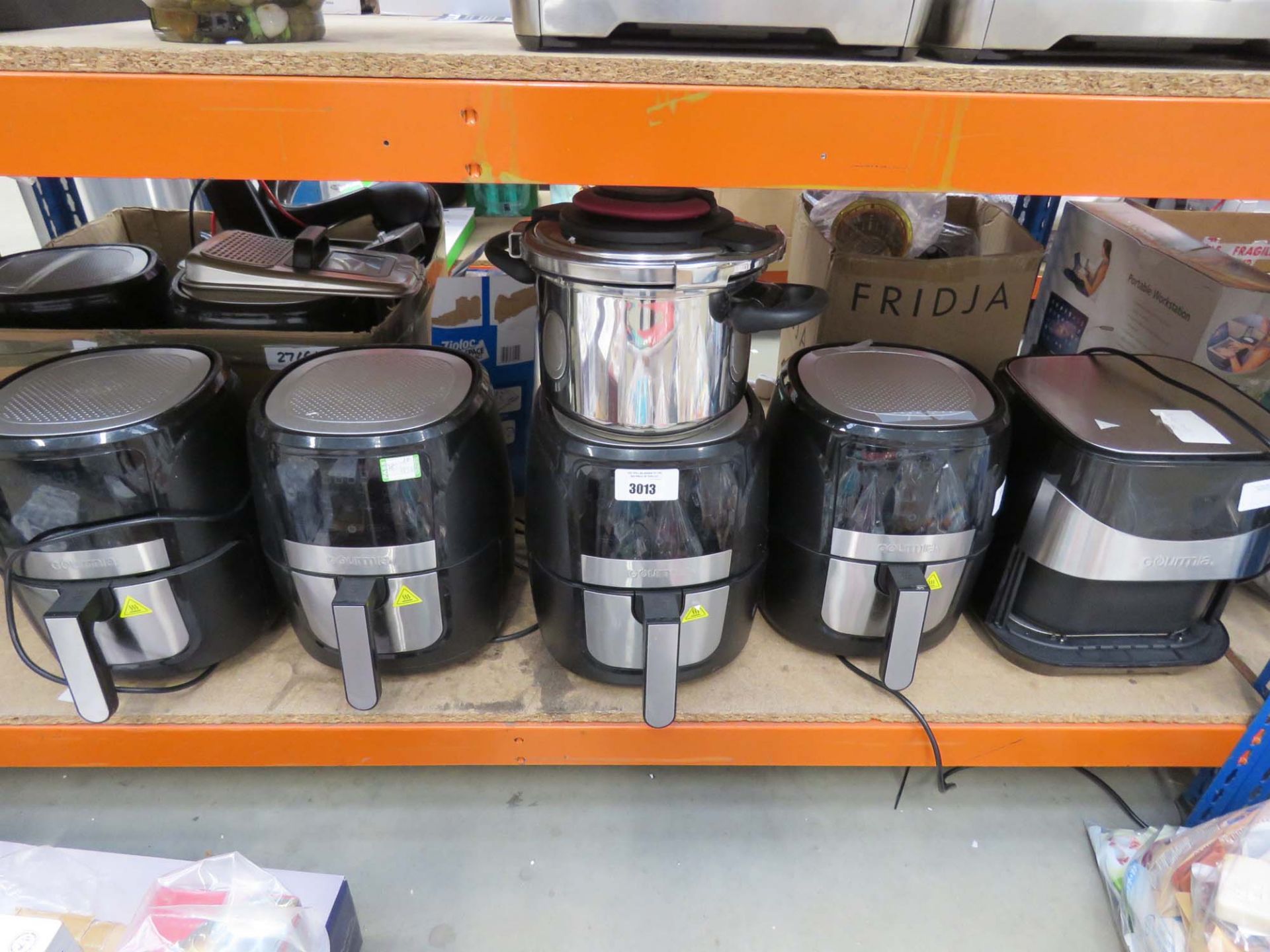 5 unboxed Gourmet fryers plus a Tefal pressure cooker