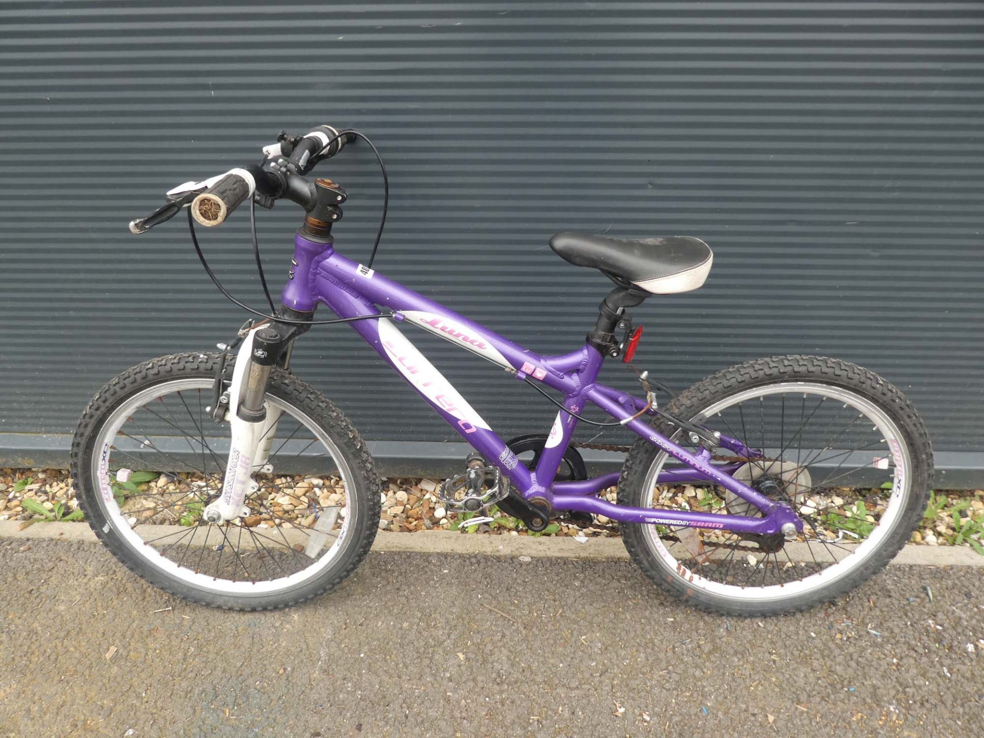 Childs purple and white Carerra bike