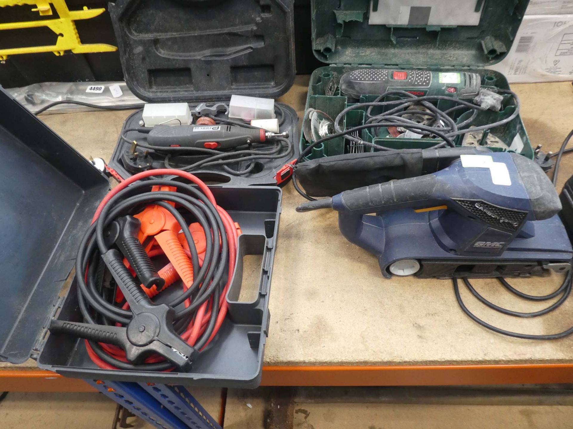 Bosch multi tool, GMC belt sander, mini tool, and set of jump leads