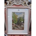 Framed and glazed watercolour of mountain stream with woodland