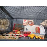 Cage containing an AirFix model, plastic toys, circus book and die cast toys