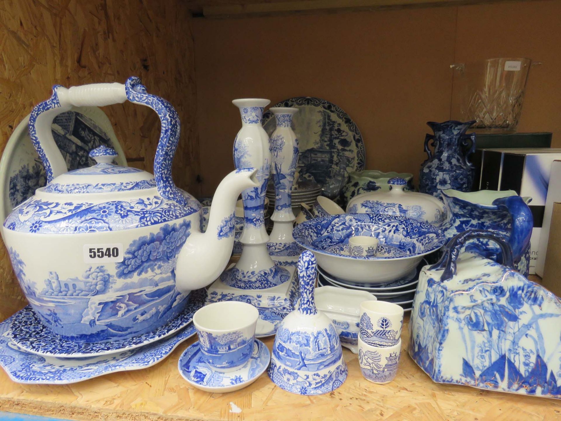 Large quantity of blue and white crockery to include cups and saucers, pudding bowls, side plates