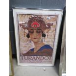 Framed and glazed opera advertising print