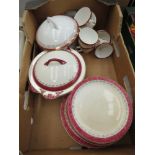 Box of Royal Tudor crockery with a red rim