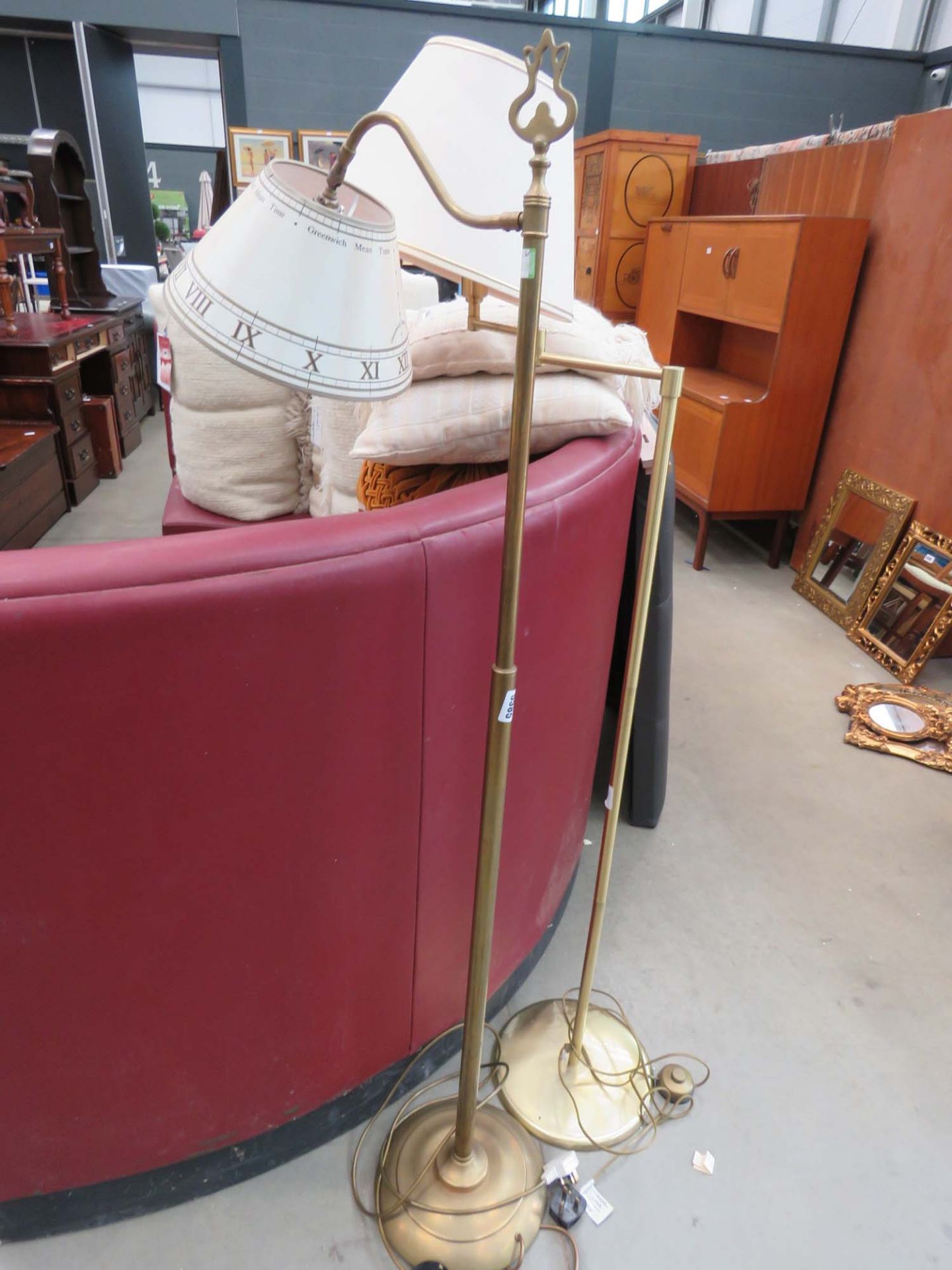 Two adjustable brushed metal floor lamps