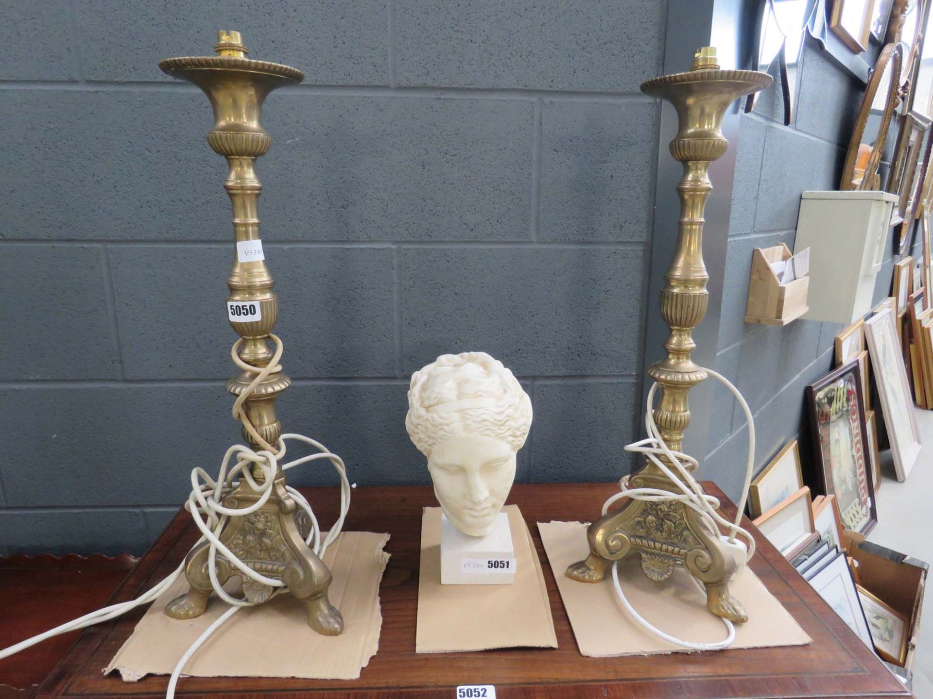 Pair of brass tripod table lamps