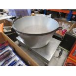 Cooking pot with swing handle plus a warming plate