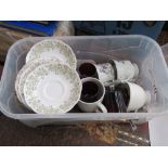 5429 - Box containing grass and floral patterned crockery plus red glasses