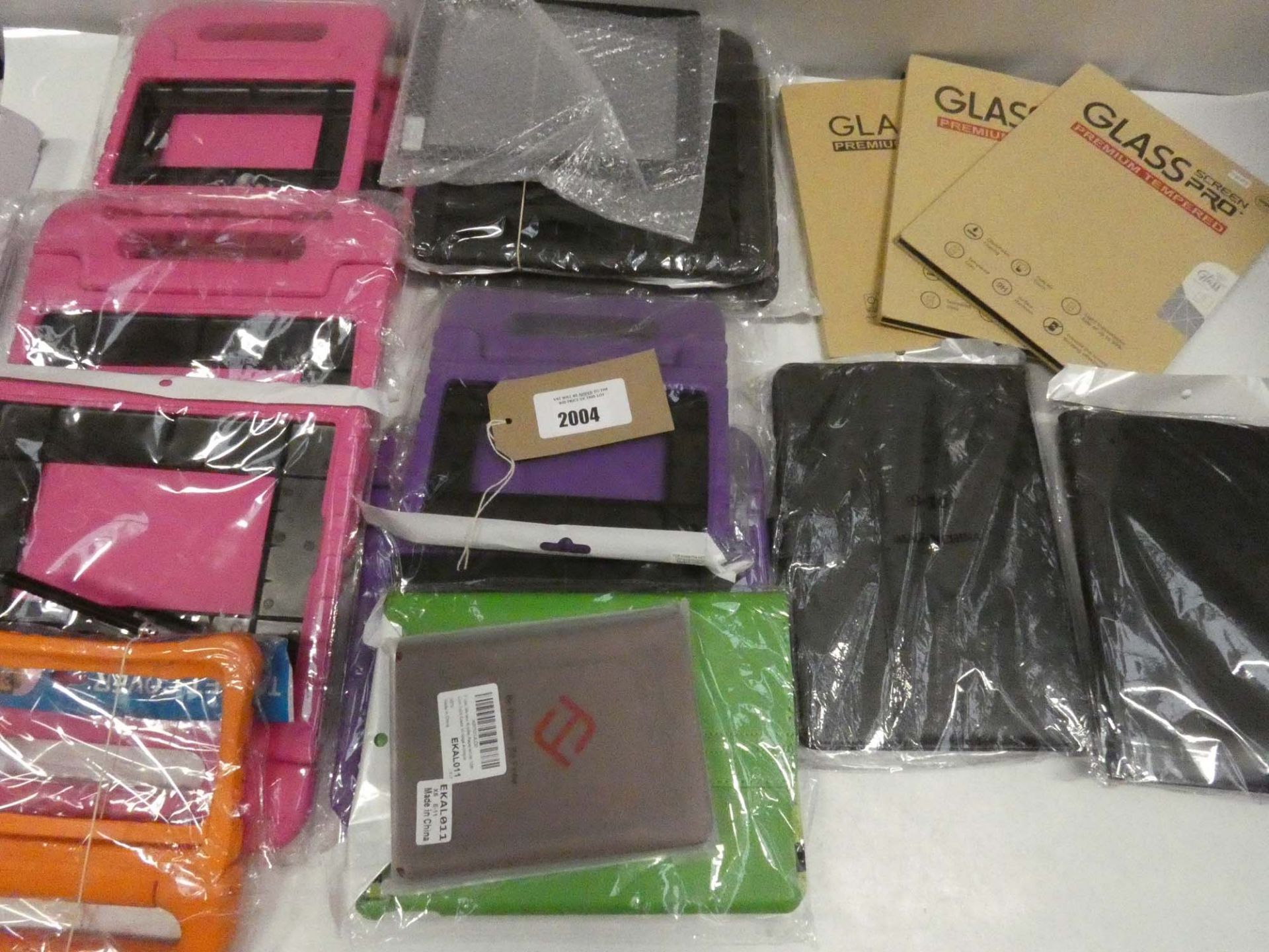 Bag containing quantity of tablet cases/covers