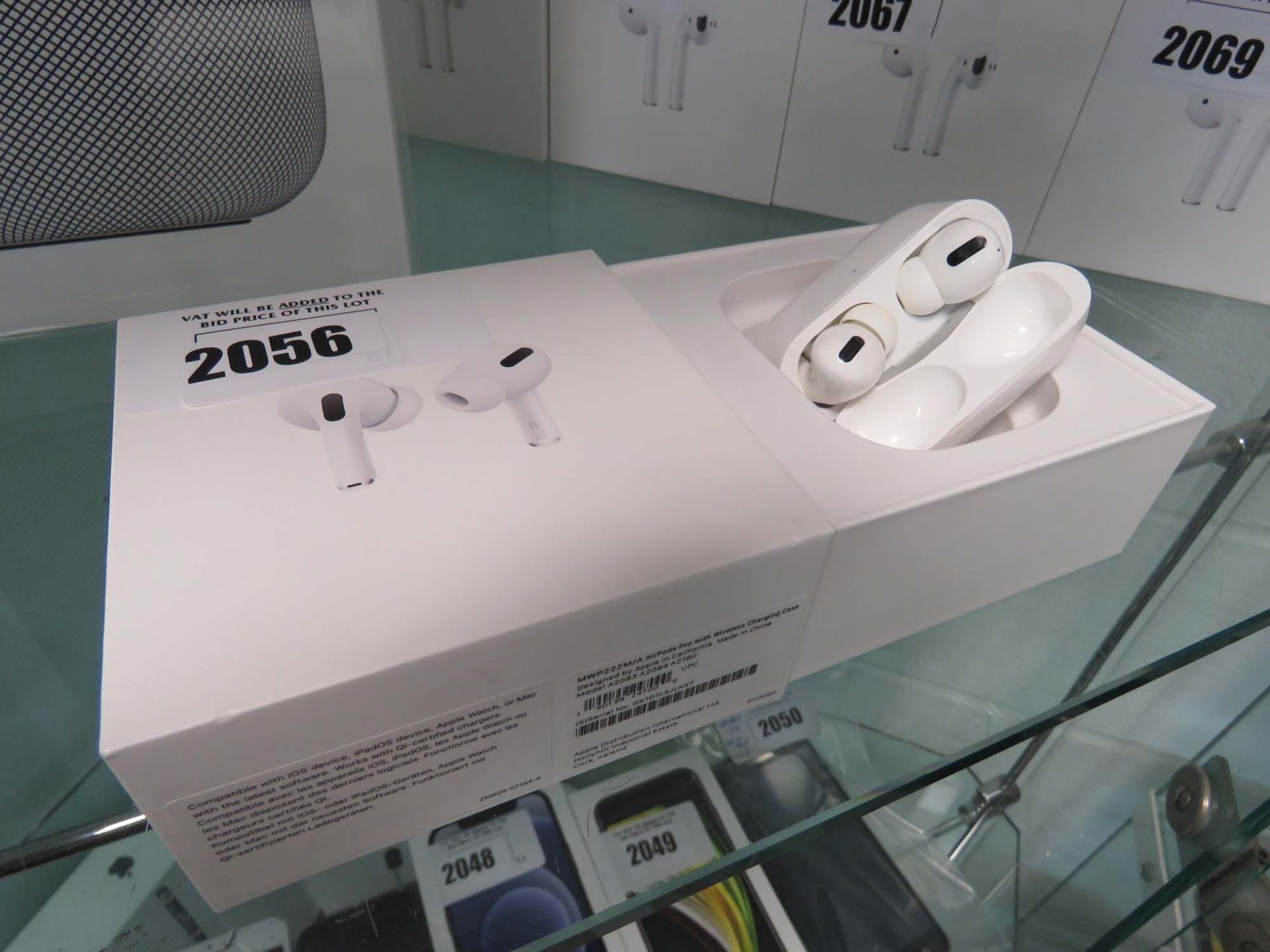 Apple AirPods Pro with wireless charging case and box