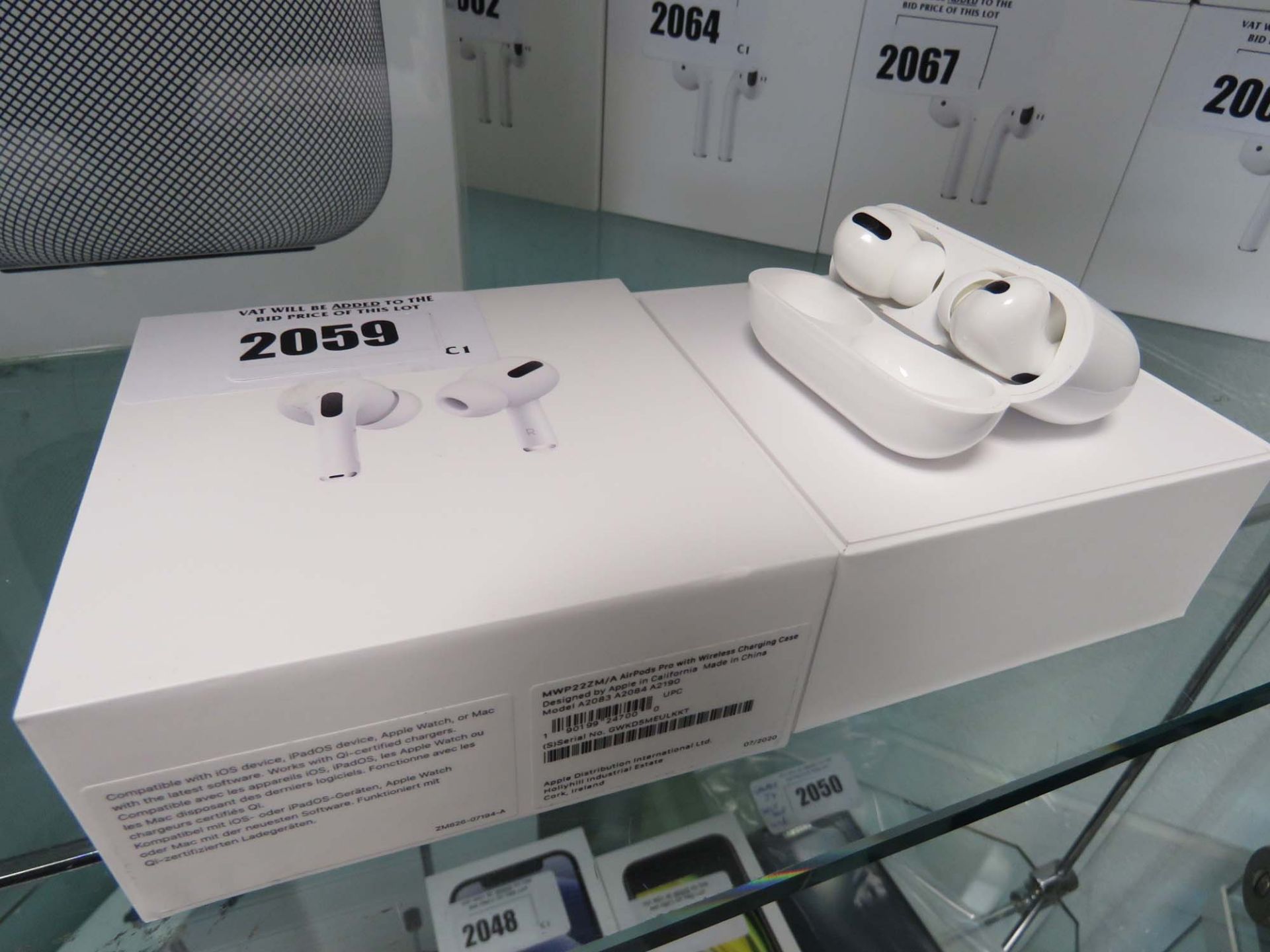 Apple AirPods Pro with wireless charging case and box