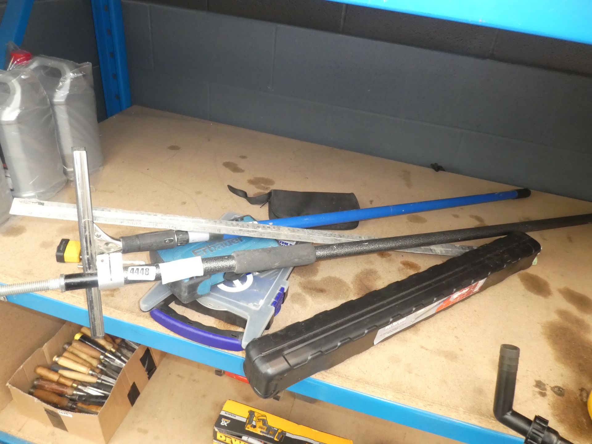 Torque wrench, screws, squeegee, plaster board stand, drill bits etc