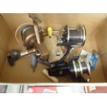 3 fishing reels and some lead weights