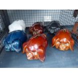 6 ceramic piggy banks in the shape of pigs