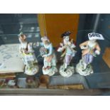 4 pieces of Dresden ware incl. musician, posy carrier and ladies walking