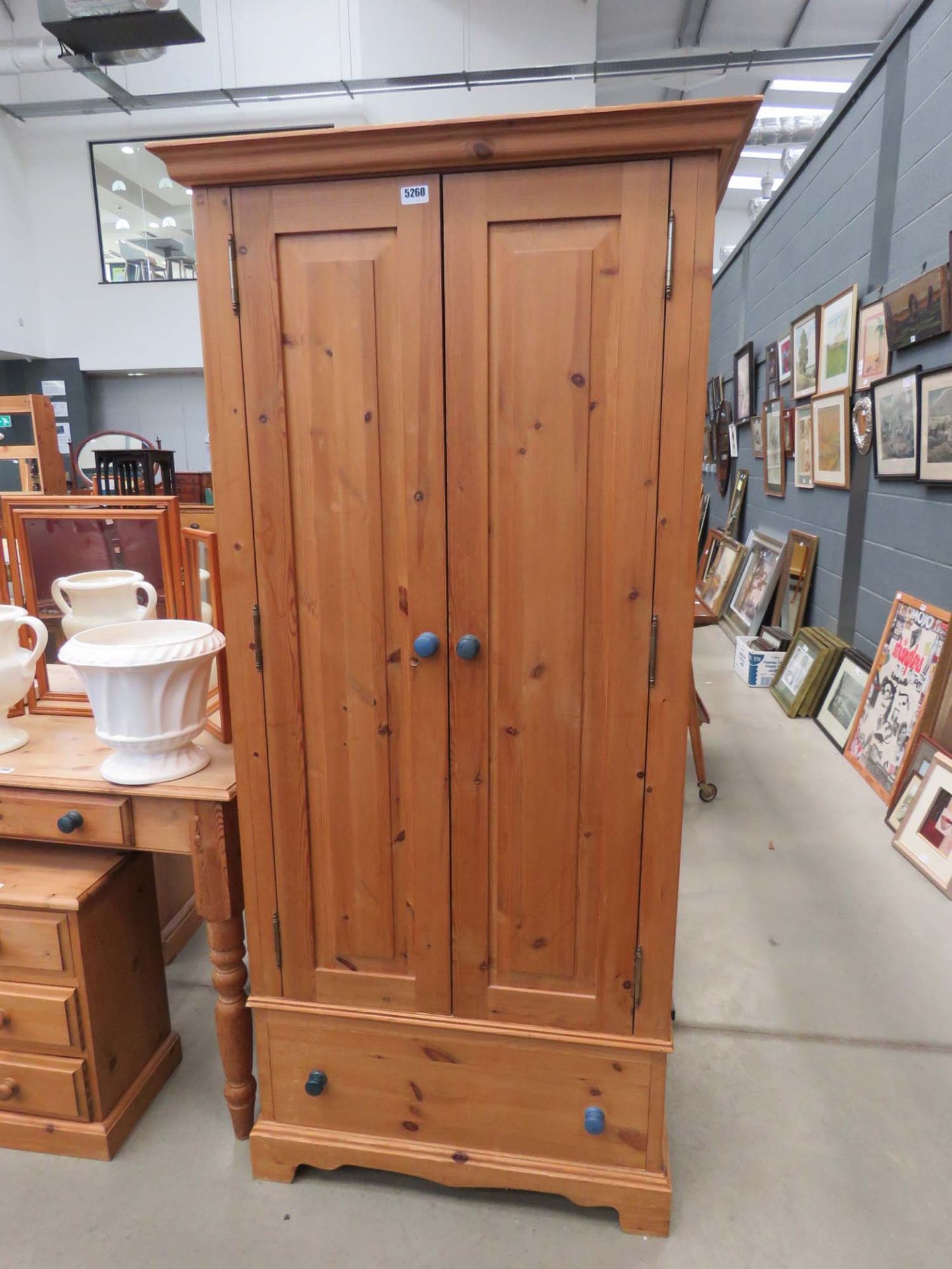 Pine two door over single drawer wardrobe