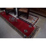3 assorted carpets with geometric and floral decoration