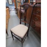 Single mahogany framed armchair with shell decorated fabric