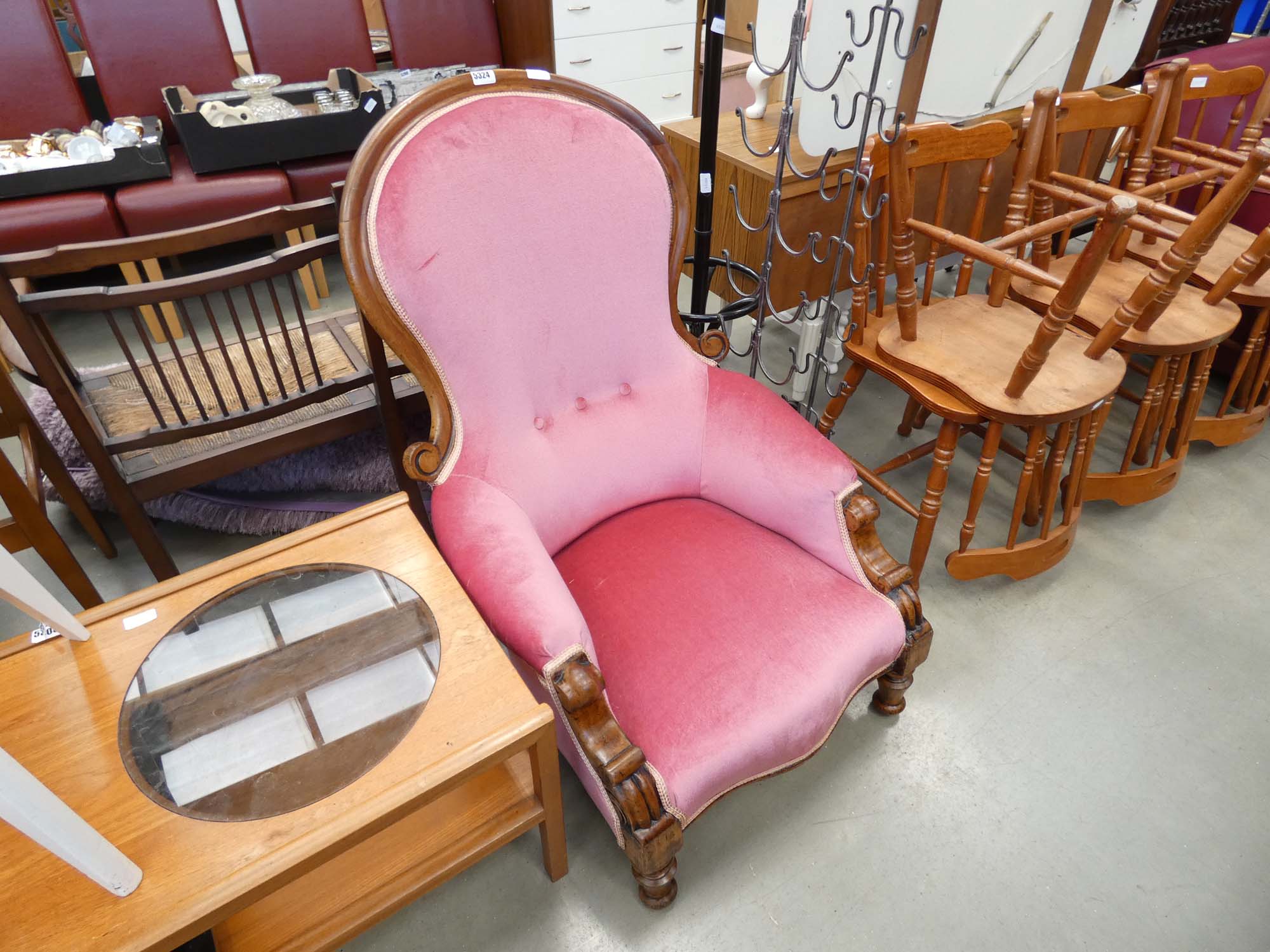 Shield back armchair on mahogany supports and pink draylon fabric