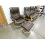 Stressless reclining swivel armchair and matching footstool in brown leather No model, headrest