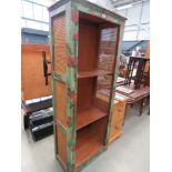 Green and floral painted shelving unit with Bergere panels