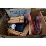 Box of assorted items to include cake mould, coat hangers and LP's