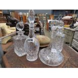 Four assorted cut glass decanters