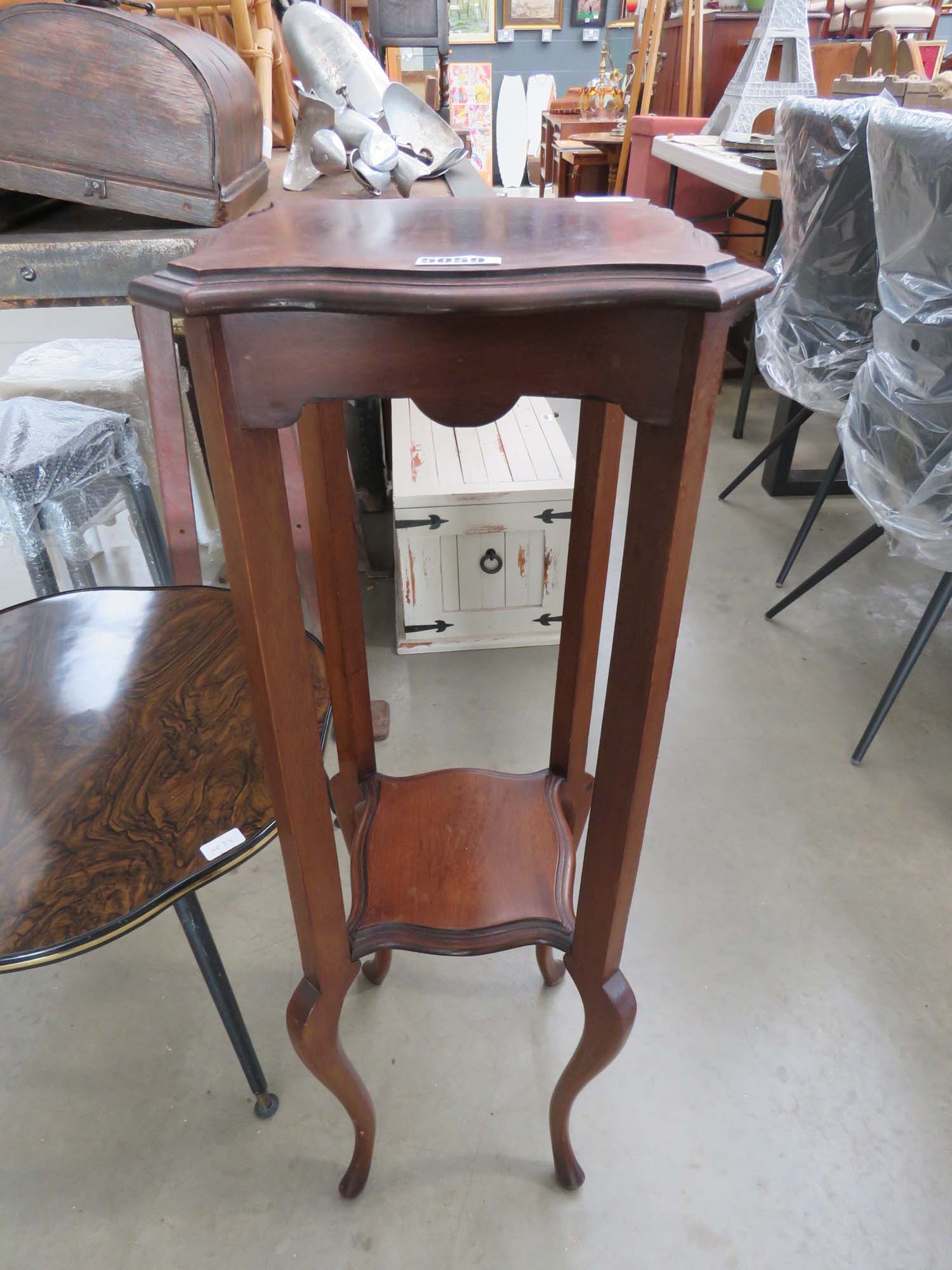 Dark wood plant stand with shelf under