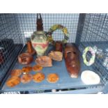 Cage containing a quantity of wooden trinket trays, coasters, face masks, etc