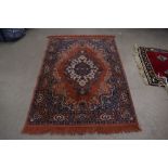 5406 - Brown and blue carpet with geometric and floral pattern