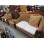 Wicker four piece suite - two armchairs, one coffee table and a matching two seater sofa