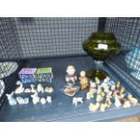 Cage containing Wade figurines, monk figurines and Wade Happy Family figurines