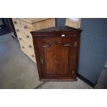 Dark wood corner cupboard