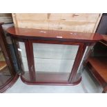 Bow fronted glazed wall hung display cabinet