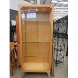 Glazed beech display cabinet