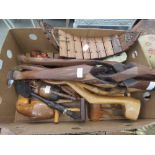 Box of assorted wooden items to include xylophone, tables supports, carved animals